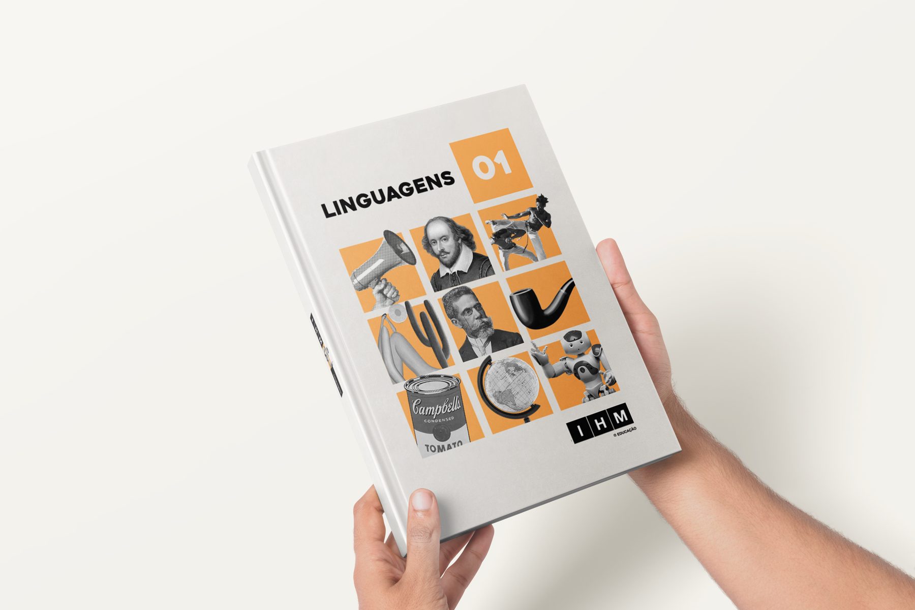 Mão segurando o livro IHM Linguagens